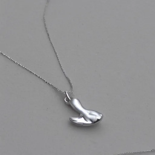 Image similar to a silver necklace on a golden duck