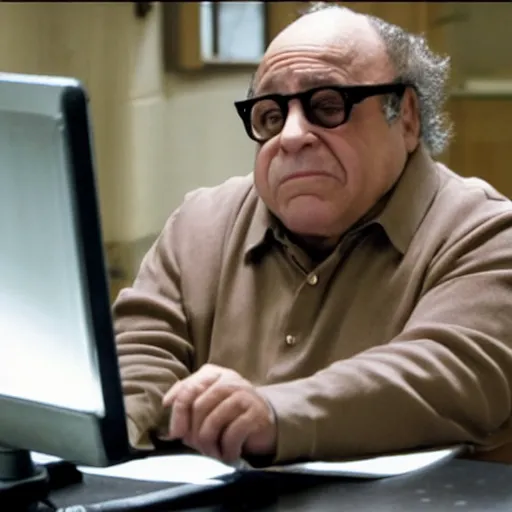 Image similar to danny devito bleary eyed at a computer, film still from the movie directed by Denis Villeneuve