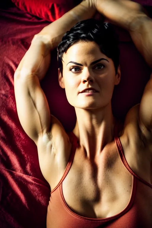 Image similar to realistic photograph. warrior woman, 2 7, in her bedclothes. tight white tanktop shows strong feminine figure. loose comfortable red pajama pants. jaimie alexander. delicate jawline. short hair, straight, ravenblack. faircomplected but tan. tall gracile, but thick ripped jacked vascular buff muscular arms and large ample bust.