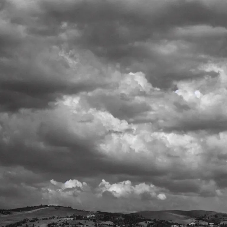 Image similar to Above him there was nothing now but the sky—a high sky, not clear, but still immeasurably high, with gray clouds quietly creeping across it.