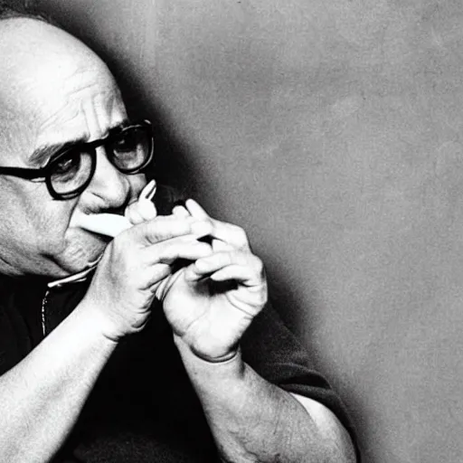 Image similar to Danny Devito smoking a cigar