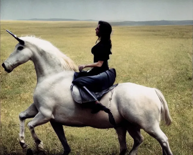 Image similar to photo of a woman riding a unicorn, photo by annie liebovitz