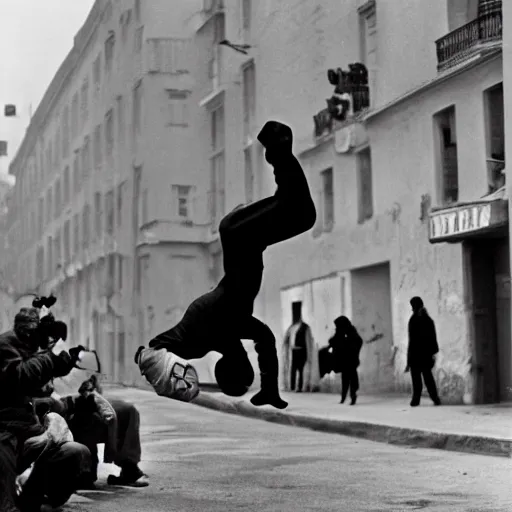 Prompt: A ski mask wearing man holding an assault rifle doing a backflip in the street, photographed by Henri Cartier-Bresson on a Leica camera