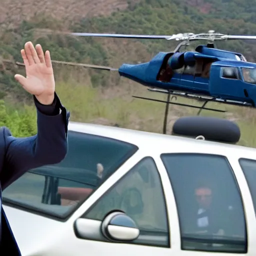 Image similar to Tom Cruise waving to fans. He's wearing bluejeans and a green jacket, Ralph Lauren. A helicopter is in the background. Shallow depth of field