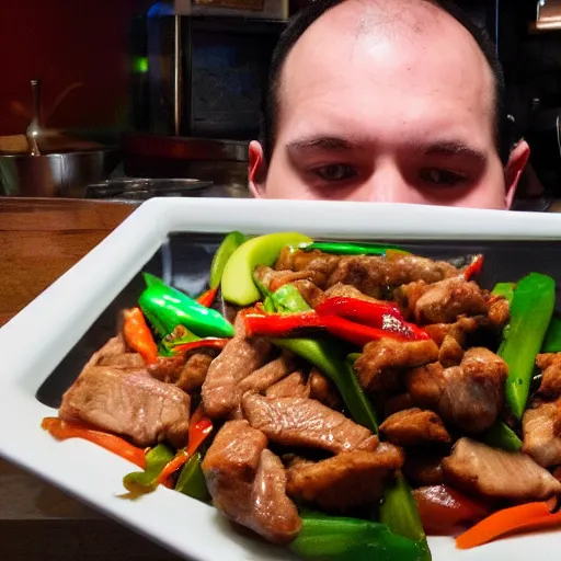 Image similar to anonymous man with face covered in stirfry pork