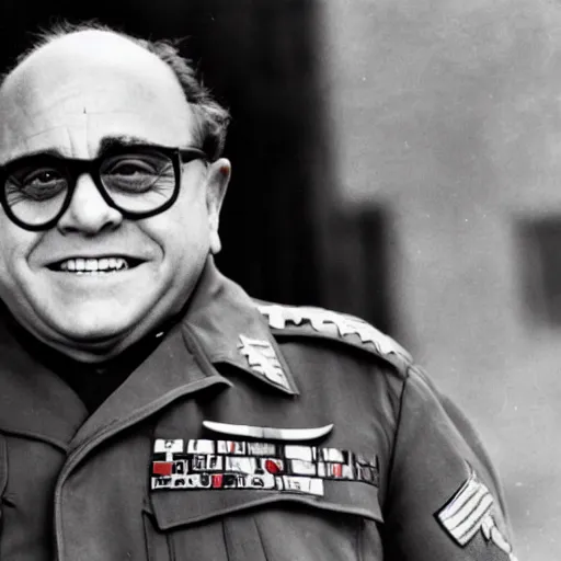 Prompt: Danny DeVito as a WW2 era American general watching a mushroom cloud explode