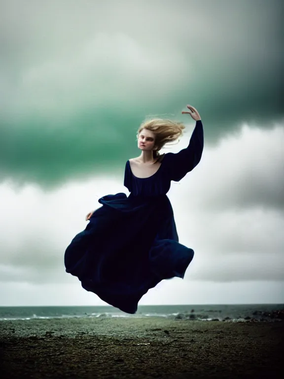 Image similar to cinestill 5 0 d photography of a woman britt marling 3 / 4 style of nicholas fols, 8 0 mm, dress in voile, hair like dark clouds floating on air, mute dramatic colours, soft blur outdoor stormy sea background, volumetric lighting, hyperdetailed, hyperrealistic