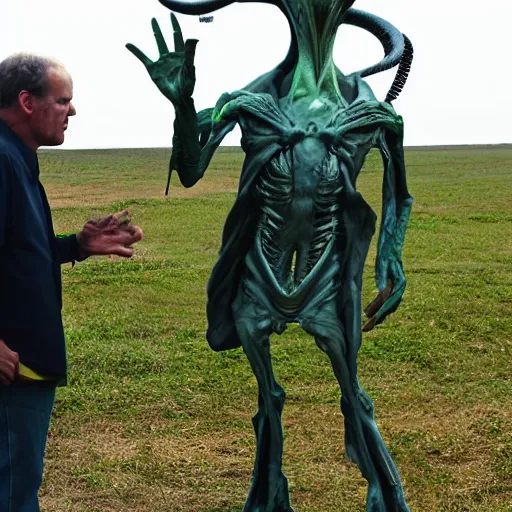 Image similar to photo, A man stand next to an alien.