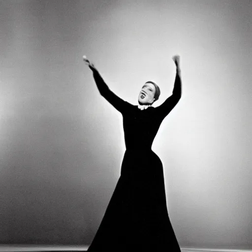 Image similar to julie andrews in all black, dancing alone on stage, dramatic lighting, very detailed photo