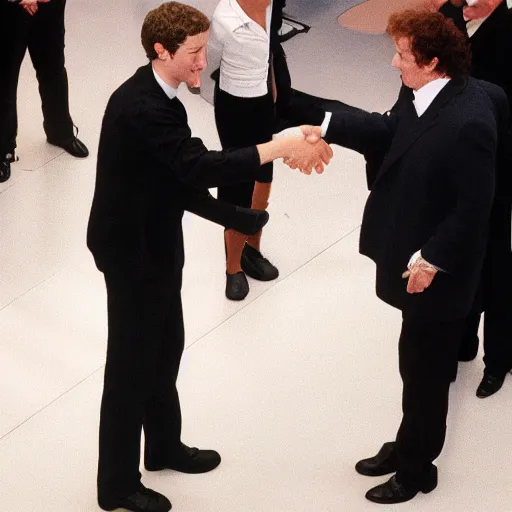 Image similar to mark zuckerberg and michael jackson shaking hands