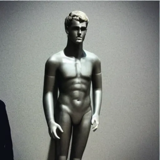 Image similar to “a realistic detailed photo of a guy who is an attractive humanoid who is half robot and half humanoid, who is a male android, actor Liam Hemsworth, shiny skin, posing like a statue, blank stare, at the museum, on display”