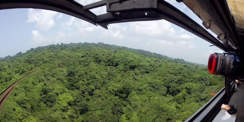 Prompt: go pro footage, top of a sri lankan train