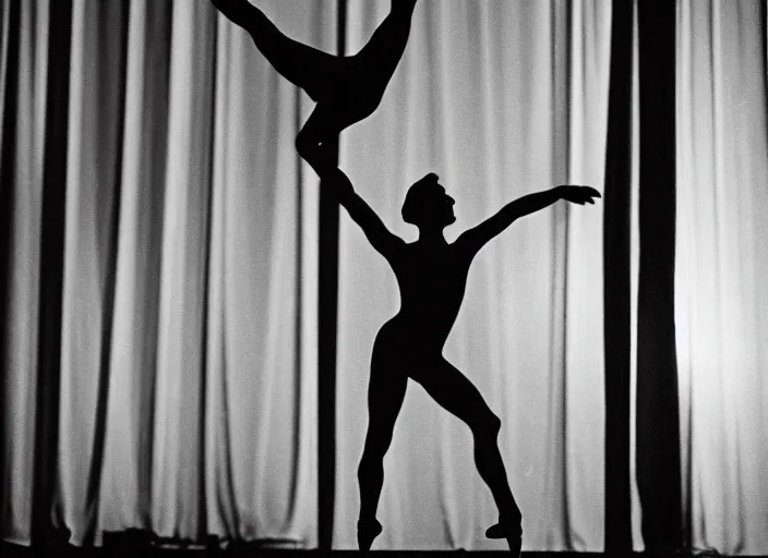 Image similar to a 3 5 mm photo from the back of a ballet dancer in the spotlight on stage in silhouette in the 1 9 6 0 s, bokeh, canon 5 0 mm, cinematic lighting, dramatic, film, photography, golden hour, depth of field, award - winning, 3 5 mm film grain