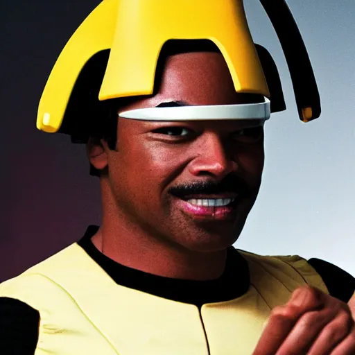 Image similar to Geordi LaForge wearing visor and a colander and random kitchen tools on his head