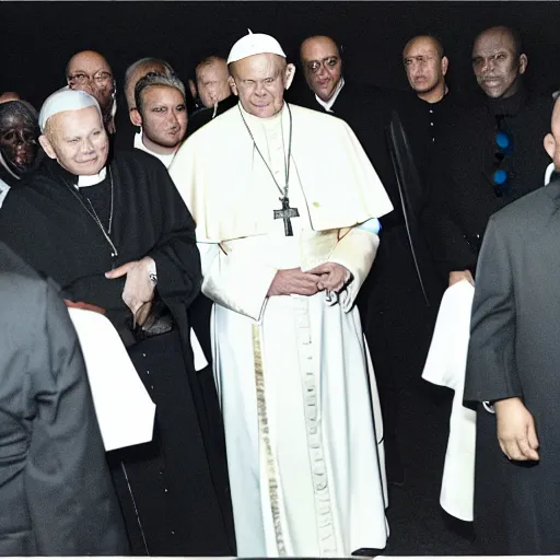 Image similar to photgraph of the pope john paul ii dressed in black at the donda listening party