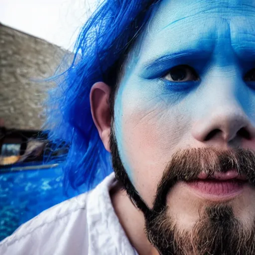 Image similar to fish eye lens close up photograph of a man with blue skin and a goatee side eyeing from below the camera with a sympathetic look