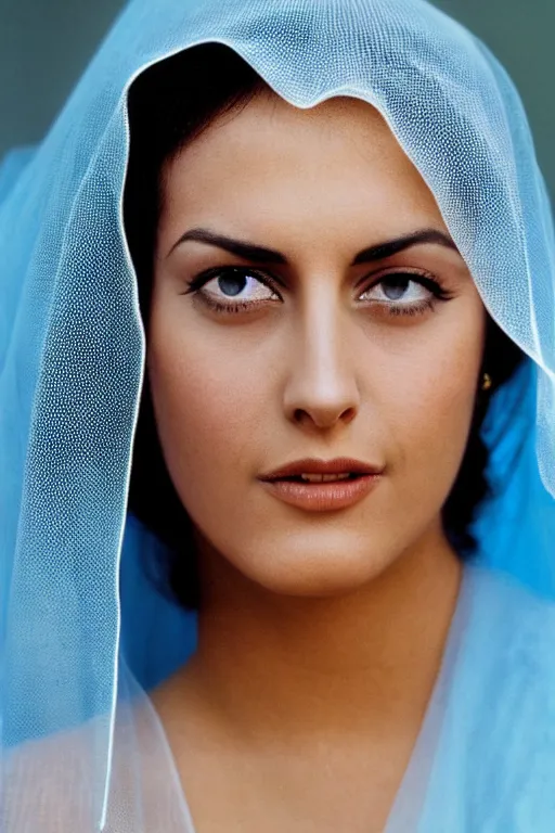 Prompt: young Monica Belluci as an Arab woman, tanned skintone, bright blue eyes, white transparent veil, headscarf, light blue long sleeves dress, closeup portrait, focus face