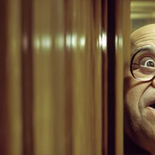 Prompt: danny devito staring at you from the other end of a dark corridor, the backrooms, kubric stare, scary, cinematic camera, hd