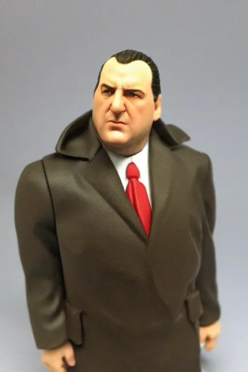 Image similar to tony soprano action figure in original packaging.