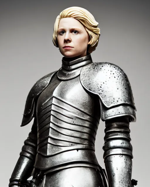 Image similar to portrait of a figurine of brienne of tarth from the fantasy series game of thrones. glossy. silver helmet, silver shoulder pads. shallow depth of field. suit of armor.