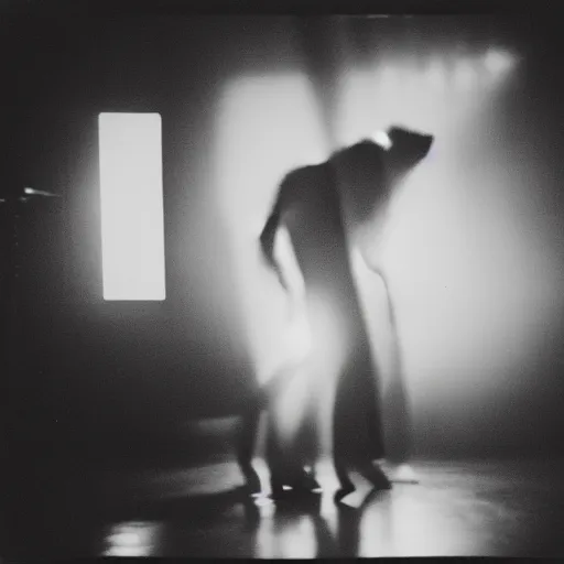 Image similar to There are two young male shadowy figures on a stage, motion blur, polaroid picture, black-and-white, 35mm