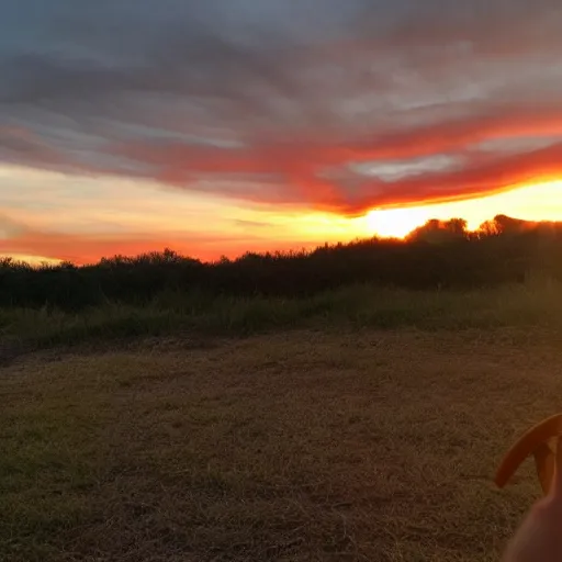 Prompt: sunset clouds in the shape of screaming chucky doll