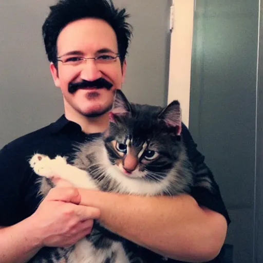 Image similar to Mark Fischbach holding a kitty, photo