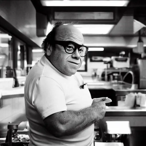 Prompt: danny devito portrait working in a fast food restaurant, in a cinematic cyberpunk style, 3 5 mm