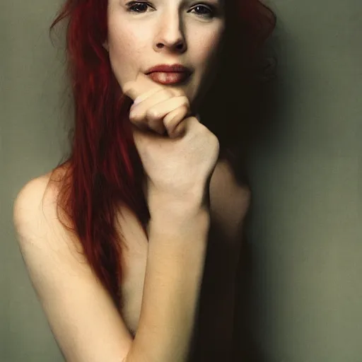 Prompt: young pretty girl with red hair smiling seductively at the camera, award winning portrait photo by annie liebowitz
