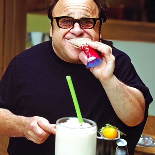 Image similar to Danny Devito drinking a smoothee