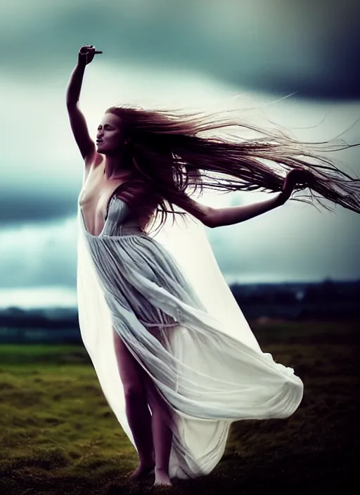 Image similar to cinestill 5 0 d portrait photo of a beautiful woman, britt marling 3 / 4, delicate, subsurface scattering, long hair floating in air in style of gilles zimmermann, 1 5 0 mm, windy mood, dress in voile, mute dramatic colours, soft blur outdoor stormy background, volumetric lighting, hyper detailed, hyper realistic