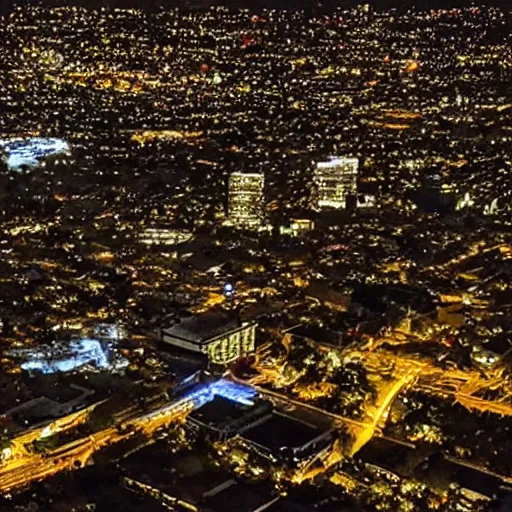 Prompt: bat signal on a los angeles building at night, photorealistic, drone view, dynamic light, ultra detailed, hyper realistic