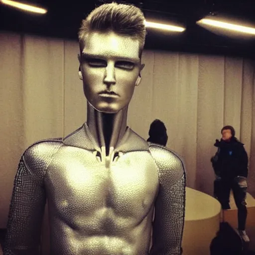 Image similar to “a realistic detailed photo of a guy who is an attractive humanoid who is half robot and half humanoid, who is a male android, singer Grant Knoche, shiny skin, posing like a statue, blank stare, on stage, on display”