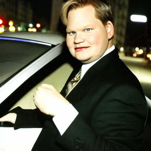 Image similar to 1 9 9 8 andy richter wearing a black wool coat and necktie in his car driving through the streets of chicago at night.