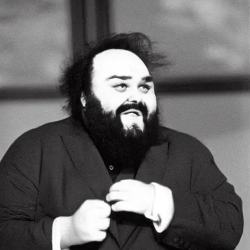 Image similar to a photo of Pavarotti when he was a cat