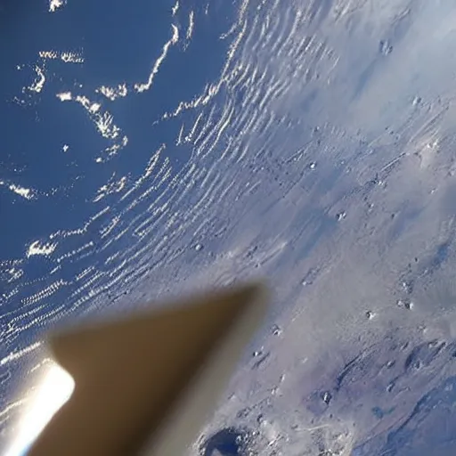 Image similar to view from the international space station window as a large asteroid strikes the surface of the earth.