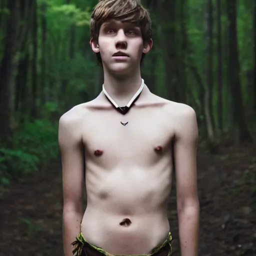 Image similar to a teenage boy, around 1 6 yo. choker necklace. natural brown hair. loincloth, pale skin. detailed face. ominous and eerie looking forest in background. natural colors. hyperrealistic photo.