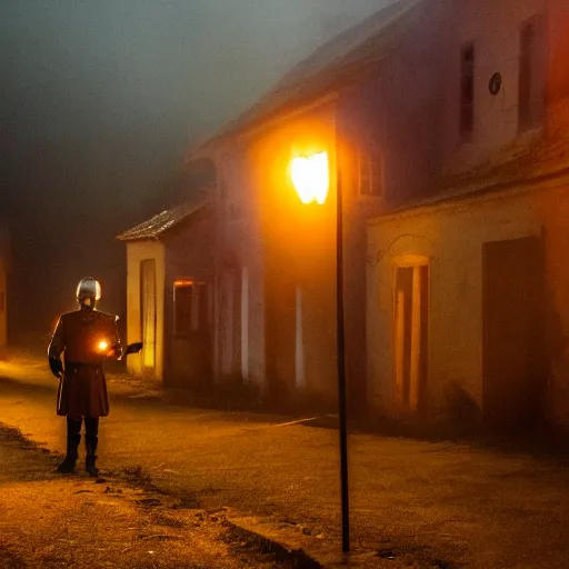 Image similar to a small village at night time, orange glowing light filters out through the windows of the houses and a thin mist has settled around then, a lone guard stands watch armed with a spear and a flaming torch, dramatic, dark moody lighting, high quality