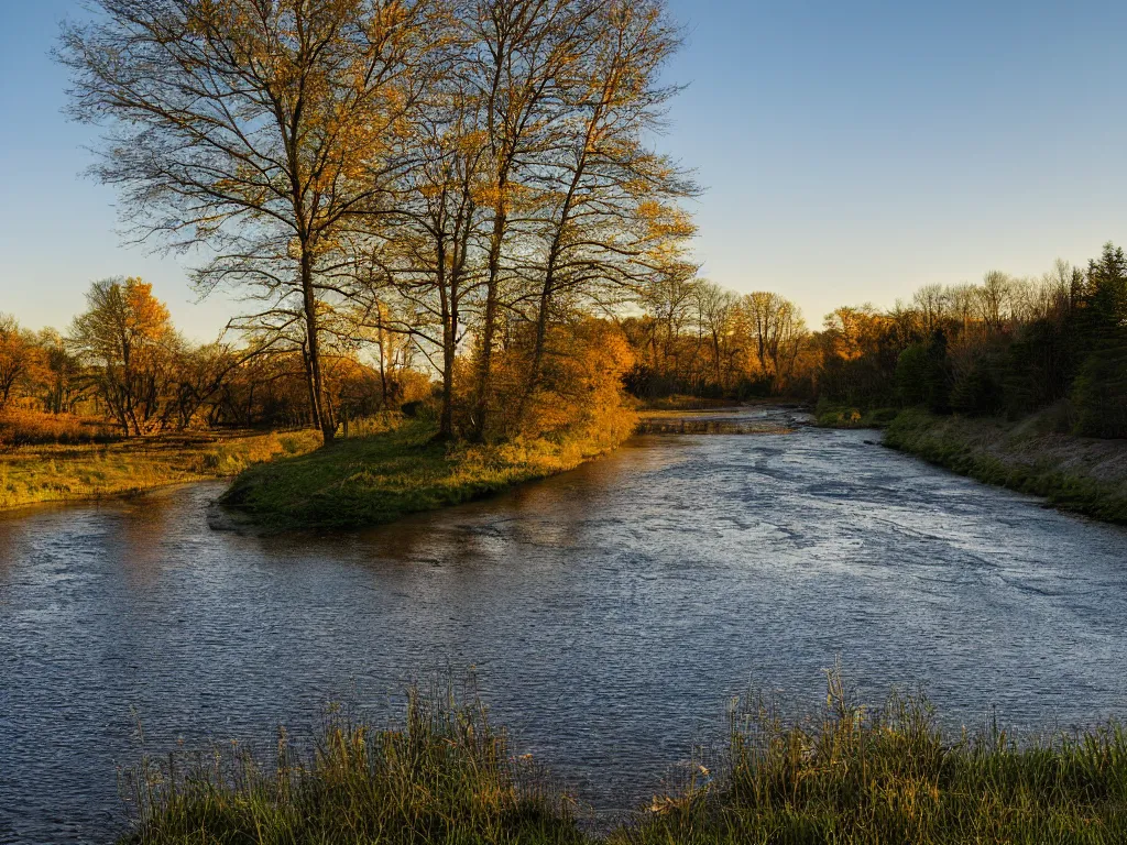 Prompt: photograph of a field by a dam and a river, new england, color, golden hour