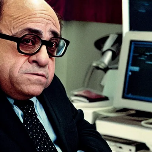 Image similar to danny devito bleary eyed at a computer, film still from the movie directed by Denis Villeneuve