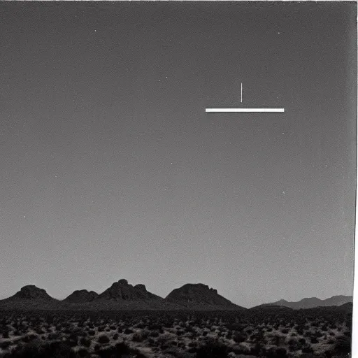 Prompt: distant ufo over the sonoran desert, super 8 camera footage, out of focus