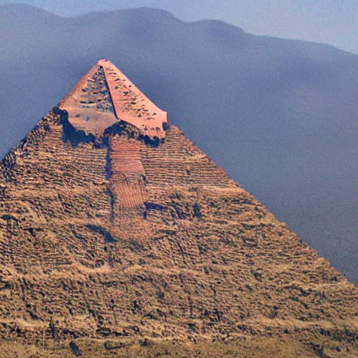 Image similar to faraway shot of a pyramid from a canyon, panoramic