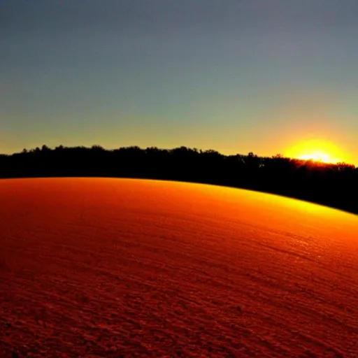 Image similar to big sun on horizon with smooth ground and parallel shadows