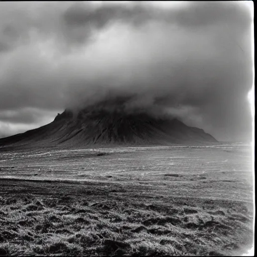 Image similar to a ww 2 photo of a battlefield in iceland. grainy, black and white, overcast sky.