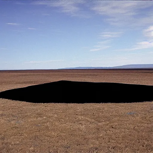 Prompt: carrizo plains on a july late afternoon with a massive sheet of black material hovering off the ground casting a shadow