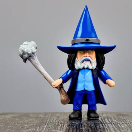 Prompt: a wizard with a blue hat vinyl figure