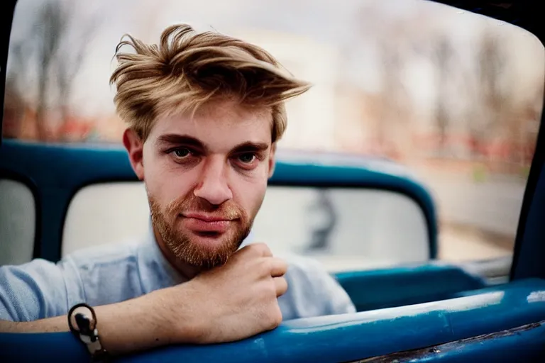 Image similar to candid photo of a Caucasian man sat in back of a UK taxi, Kodak Portra 400,8K,highly detailed: beautiful perspective extreme closeup portrait photo in style of 2000s retrofuturism, photography fashion edition, tilt shift, highly detailed, focus on man ;blonde hair;blue eyes, clear eyes, soft lighting