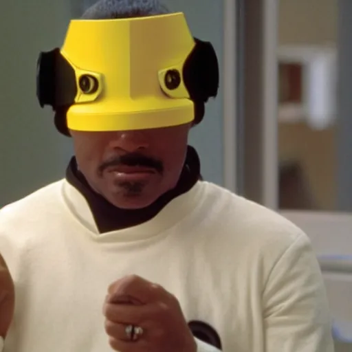 Image similar to Geordi La Forge wearing visor and a colander and random kitchen tools on his head