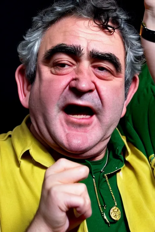 Image similar to gordon brown mixed with john belushi, dark black hair, wearing a green umbro tracksuit and gold necklace star shaped medallion, hands raised in the air,