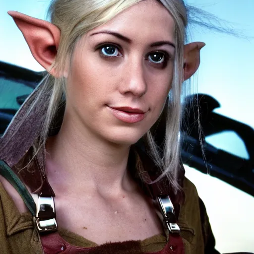 Image similar to close up headshot of a skinny female high-fantasy elf with a long face narrow chin and short spiky blonde hair wearing dark brown overalls and holding a bomb next to a destroyed car, gel spiked blond hair, small ears, narrow lips, high resolution film still, HDR color